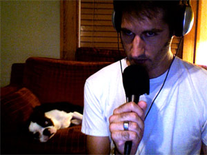 Me podcasting while Elsa sleeps behind me