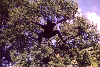 Jumping on a trampoline in 1995.